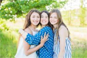 family posing with montana greenery4